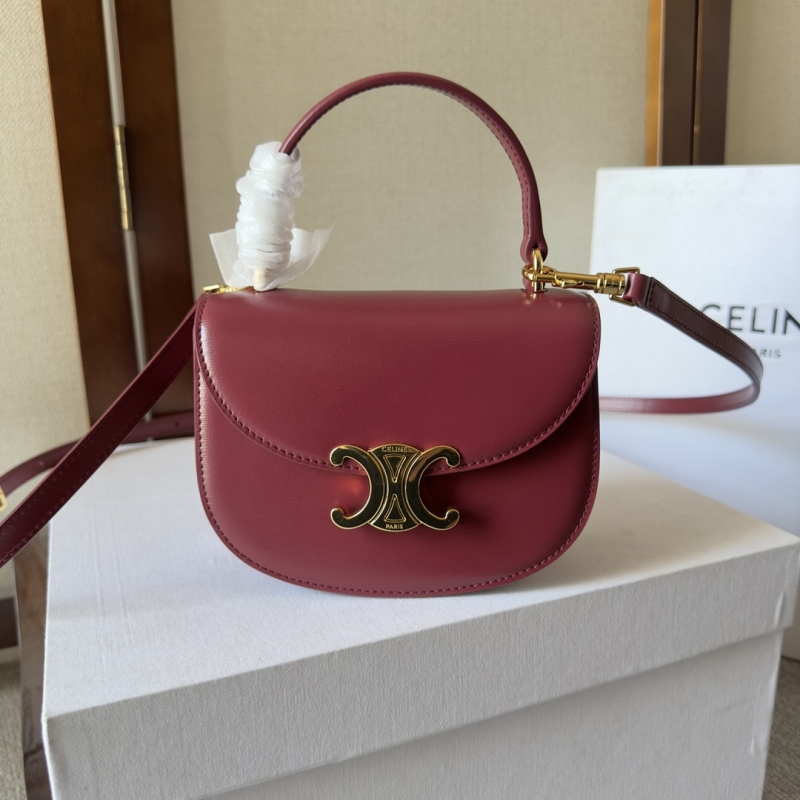 Ce**e top handle bags